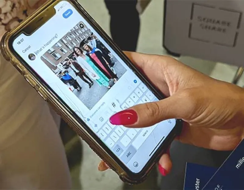 Uploading a graduation photo on social media